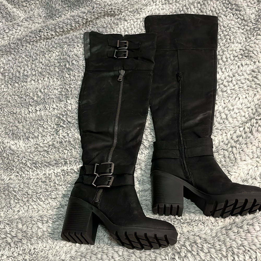 Thigh high black boots